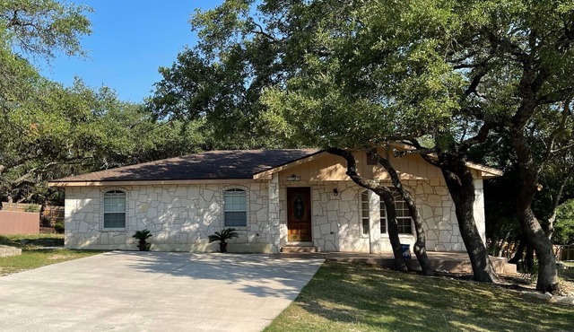 3 minutes to the lake! Half acre retreat close to river!