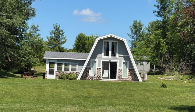 A frame cabin on private Long Lake 12 mi NW Bemidji. AC sleeps 5- 2 dogs allowed