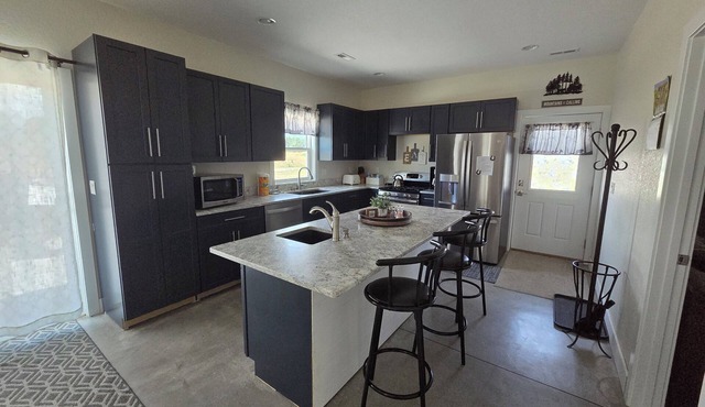 Country home on scenic, quiet acreage near Monument. Convenient to interstate.