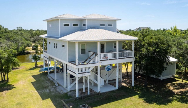 Wild Horses, Wilder Views: Stunning Carova Canal Front Home