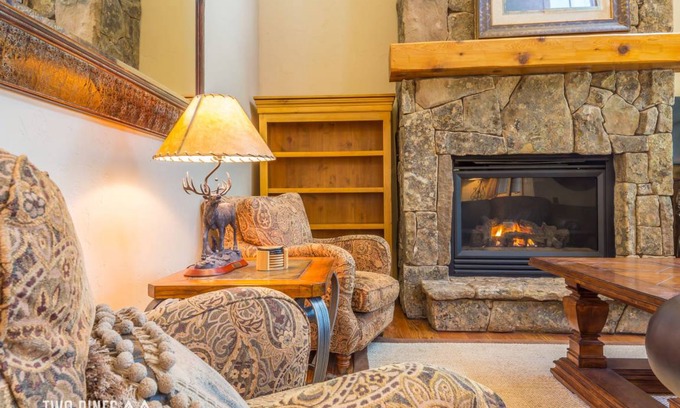 Big Sky House | Trotwood Townhome Cozy up to the Fireplace on a Snowy Night!